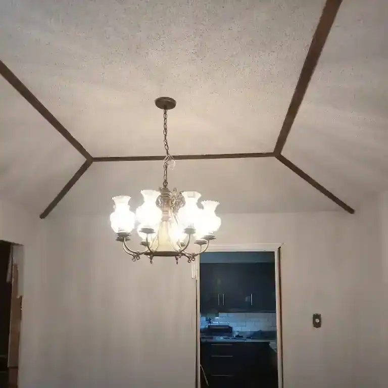 classic dining room with popcorn textured ceilings