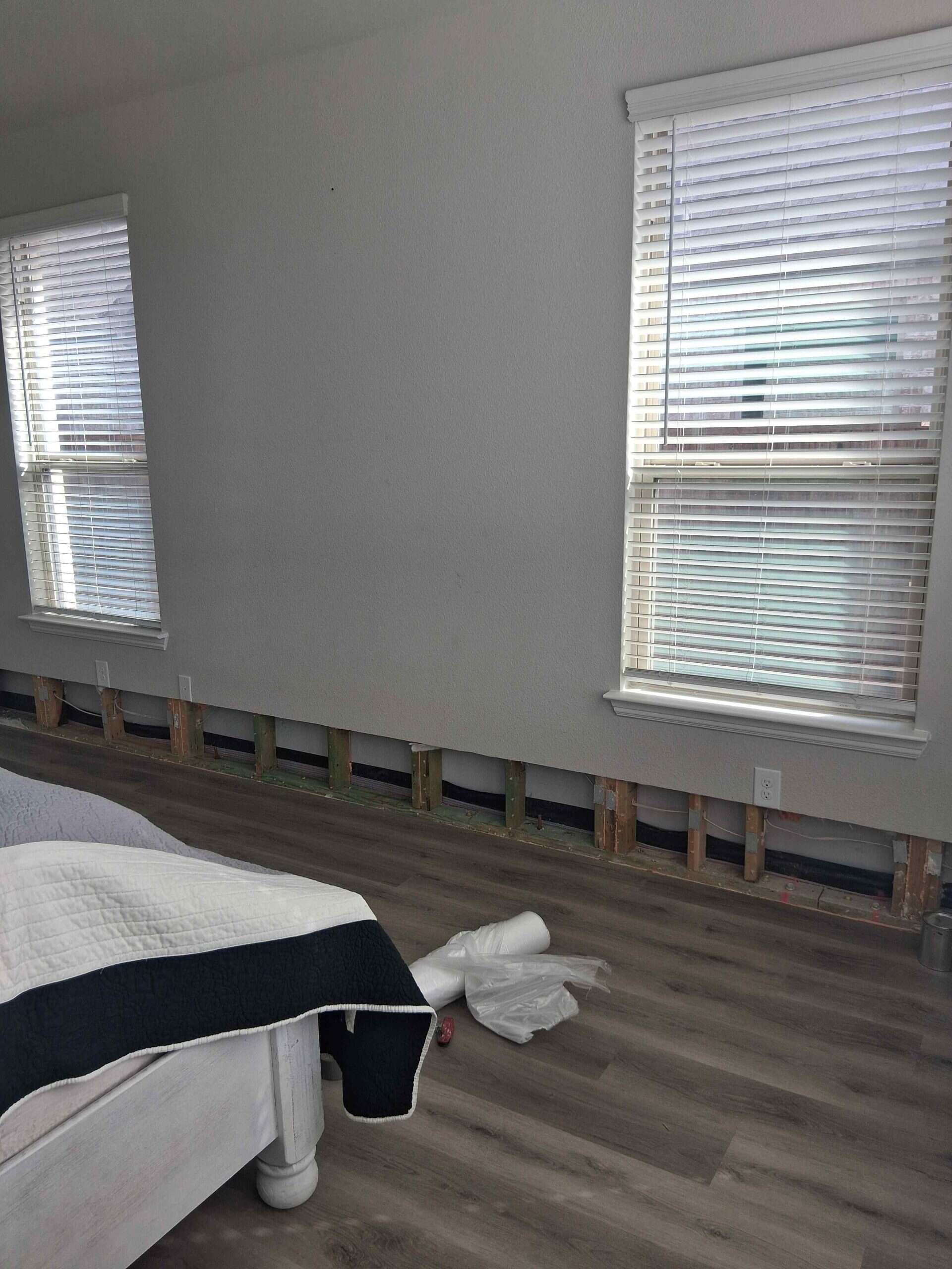 Before repairing drywall flood cuts in the master bedroom.